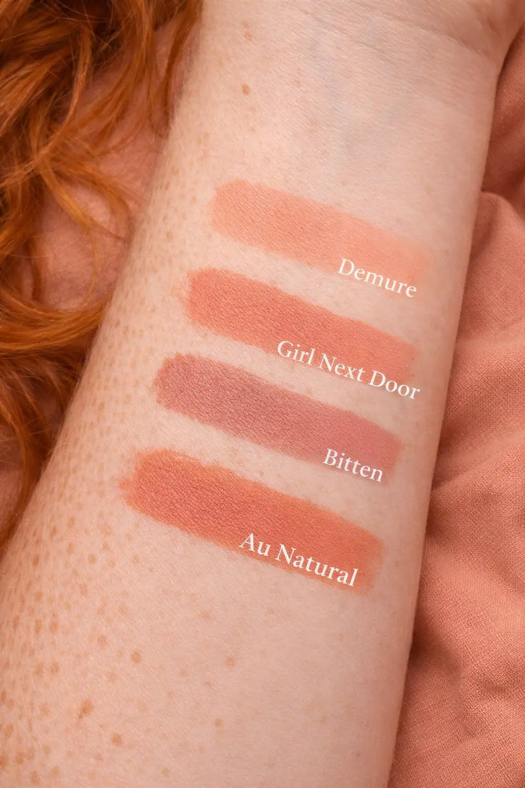 Redhead Revolution's Color Wash Lipstick Swatches on arm